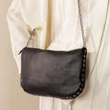 leather-cross-bag-biba-orange-ora1l-black-lifestyle