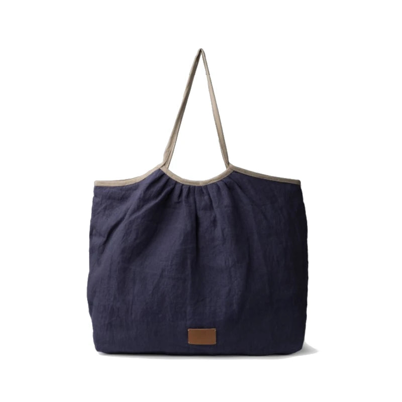saco de ombro reversível em linho azul da Biba